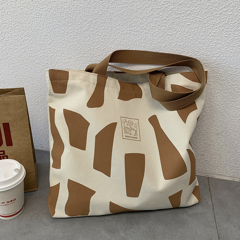 Explore the unique design features of canvas beach tote bags, their versatile uses, and how XINHUI offers customizable options.