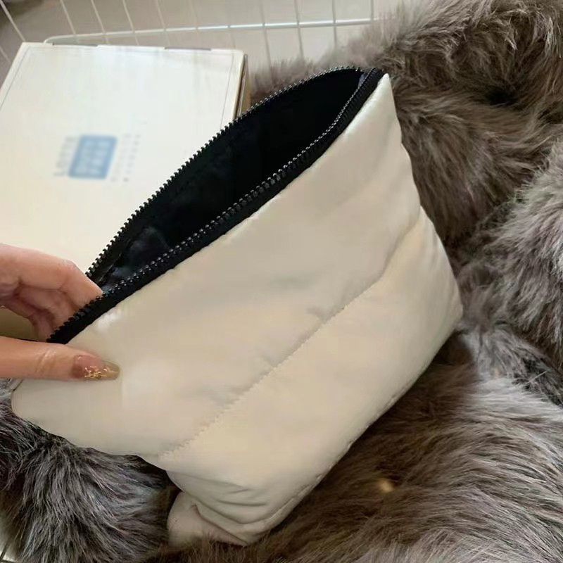 Explore the unique design features of custom makeup bags, their versatile uses, and how XINHUI offers customizable options.