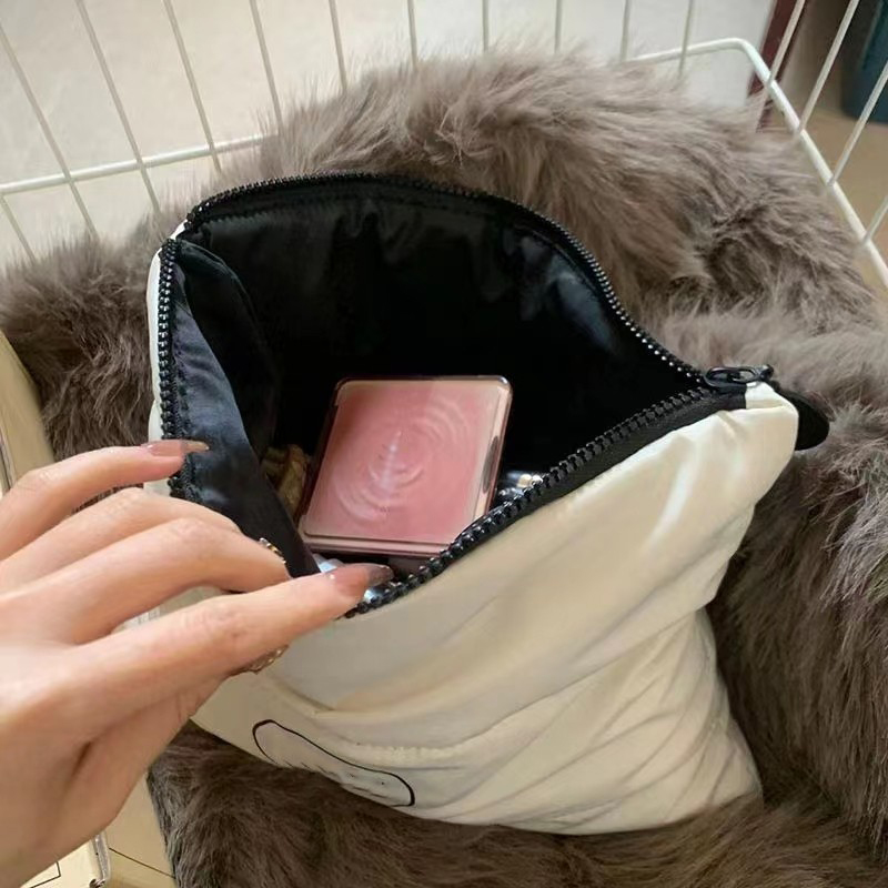 Explore the unique design features of custom makeup bags, their versatile uses, and how XINHUI offers customizable options.
