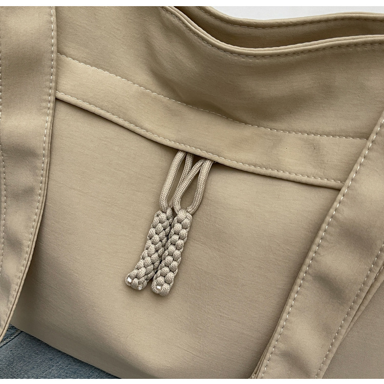 Explore the unique design features of canvas crossbody tote bag, their versatile uses, and how XINHUI offers customizable options.