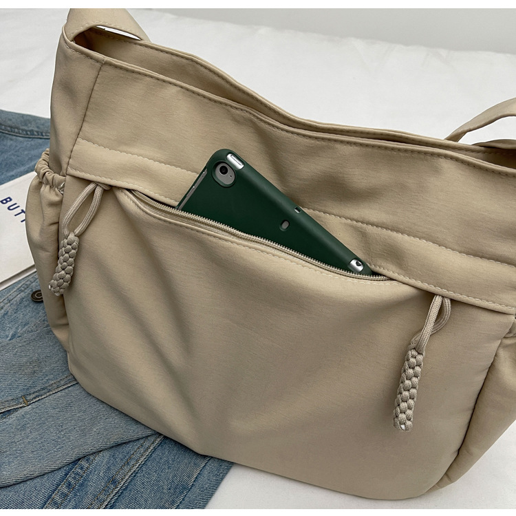 Explore the unique design features of canvas crossbody tote bag, their versatile uses, and how XINHUI offers customizable options.