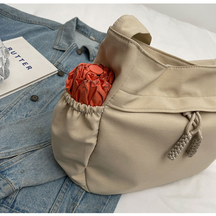 Explore the unique design features of canvas crossbody tote bag, their versatile uses, and how XINHUI offers customizable options.