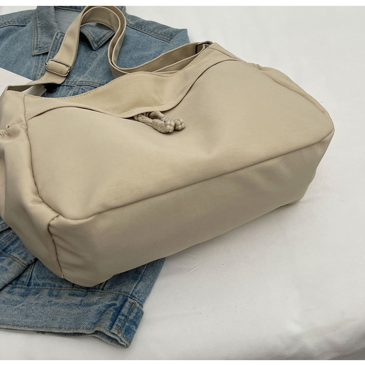 Explore the unique design features of canvas crossbody tote bag, their versatile uses, and how XINHUI offers customizable options.