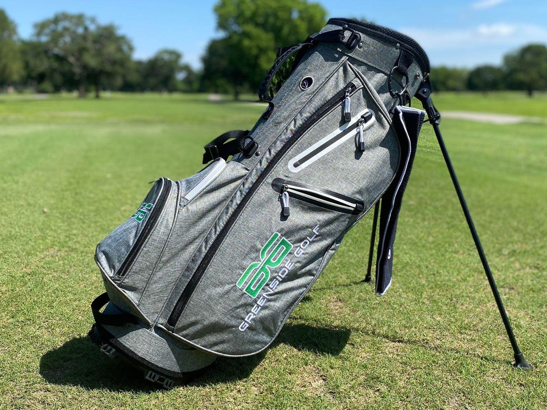 A lightweight golf bag attached to a push golf cart