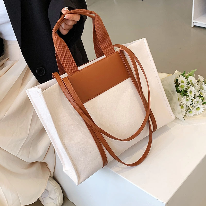 Explore the unique design features of blank canvas tote bags wholesale, their versatile uses, and how XINHUI offers customizable options.