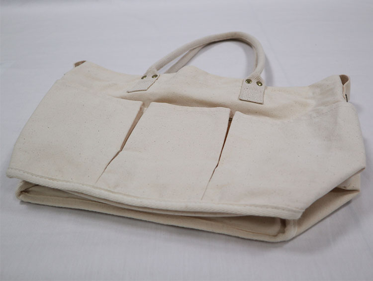 Explore the unique design features of corduroy tote bag with zipper, their versatile uses, and how XINHUI offers customizable options.