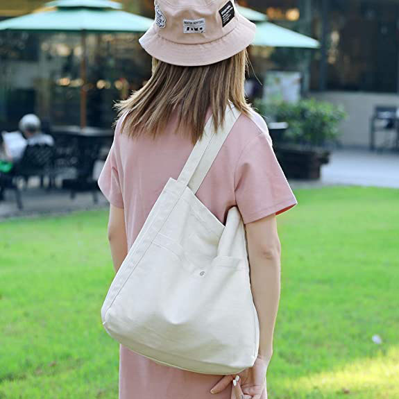 Explore the unique design features of crossbody canvas bags for women, their versatile uses, and how XINHUI offers customizable options.