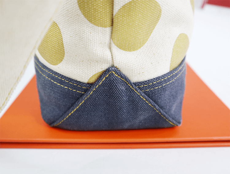 Explore the unique design features of yellow cotton tote bag, their versatile uses, and how XINHUI offers customizable options.