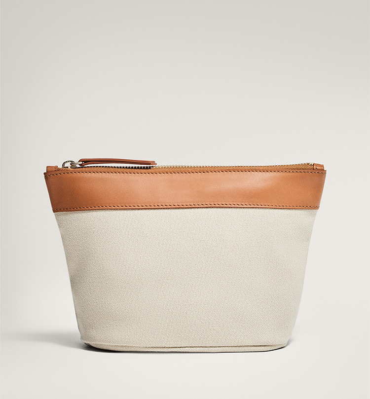 Explore the unique design features of cosmetic pouch for travel, their versatile uses, and how XINHUI offers customizable options.