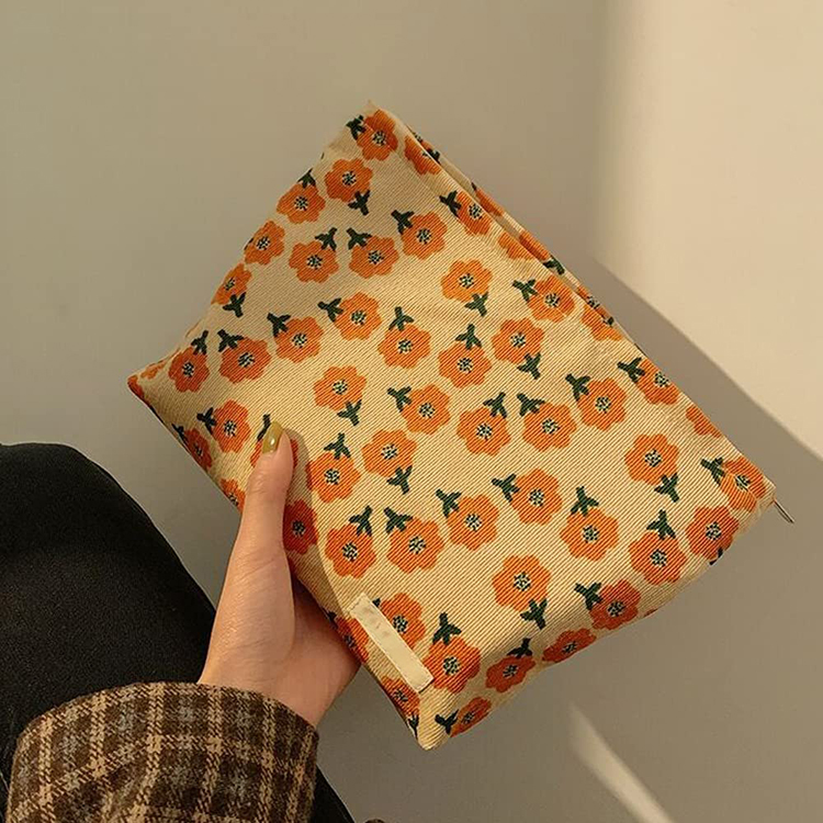 Explore the unique design features of floral makeup pouch, their versatile uses, and how XINHUI offers customizable options.
