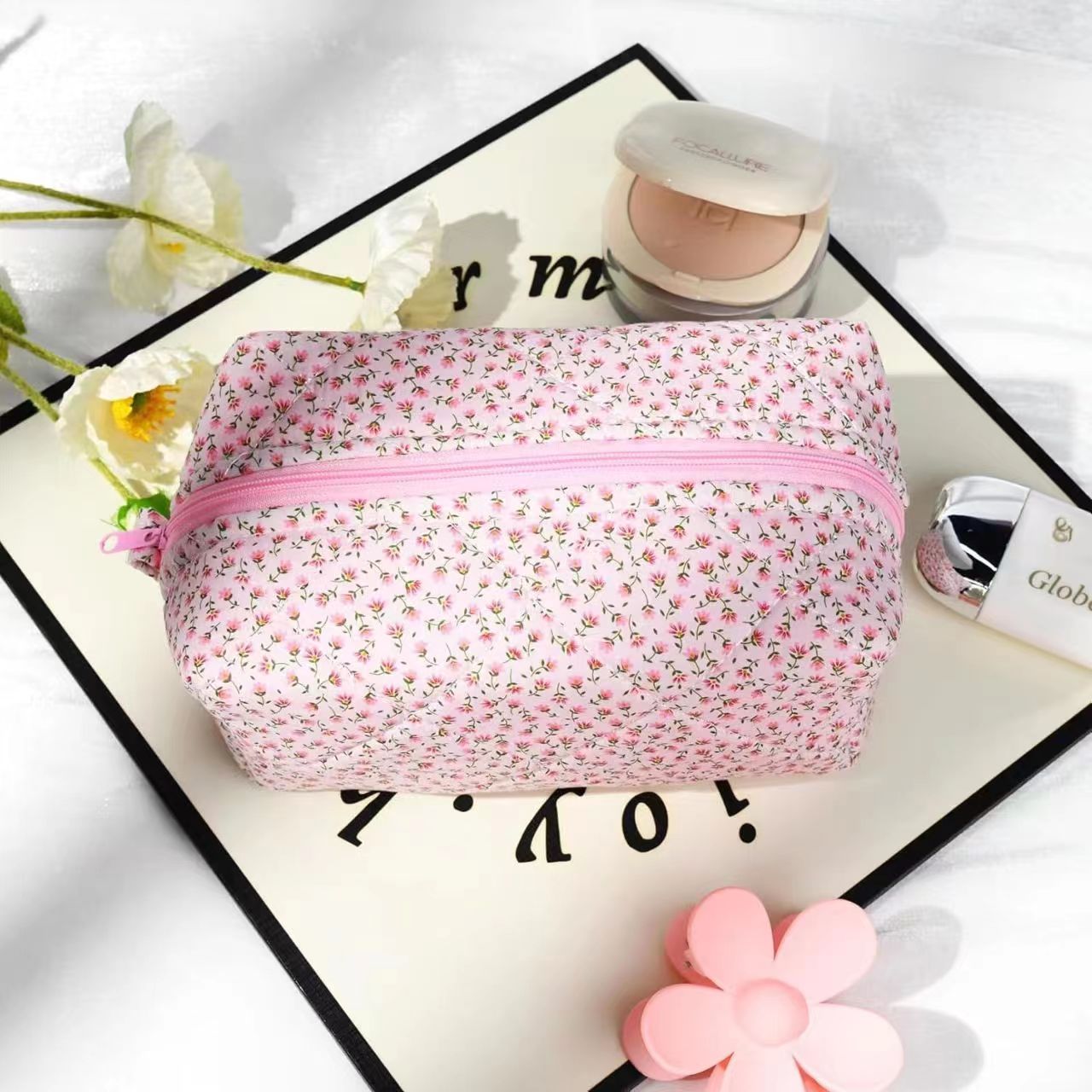 Explore the unique design features of floral cosmetic bag, their versatile uses, and how XINHUI offers customizable options.