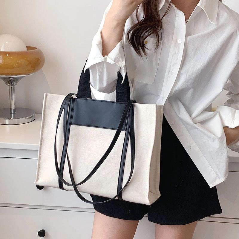 Explore the unique design features of blank canvas tote bags wholesale, their versatile uses, and how XINHUI offers customizable options.