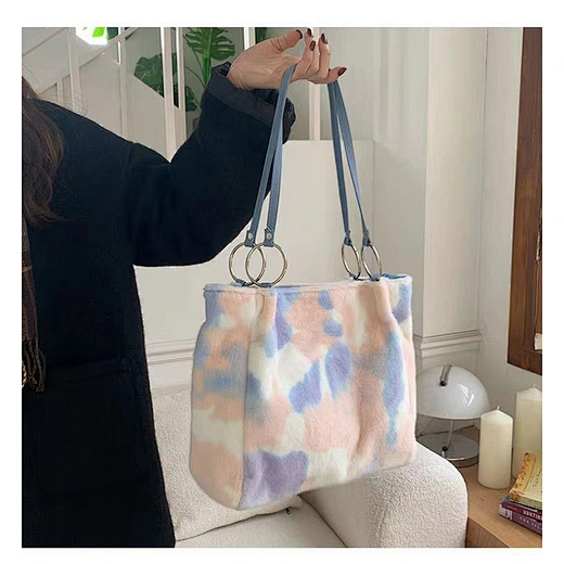 Soft and trendy fuzzy tote bag, adding a playful touch to your everyday look.