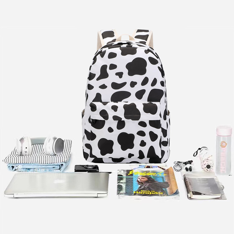 Explore the unique design features of cow print backpack, their versatile uses, and how XINHUI offers customizable options.