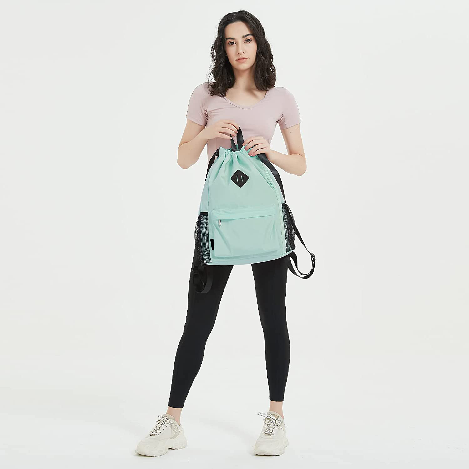 Explore the unique design features of drawstring backpack waterproof, their versatile uses, and how XINHUI offers customizable options.
