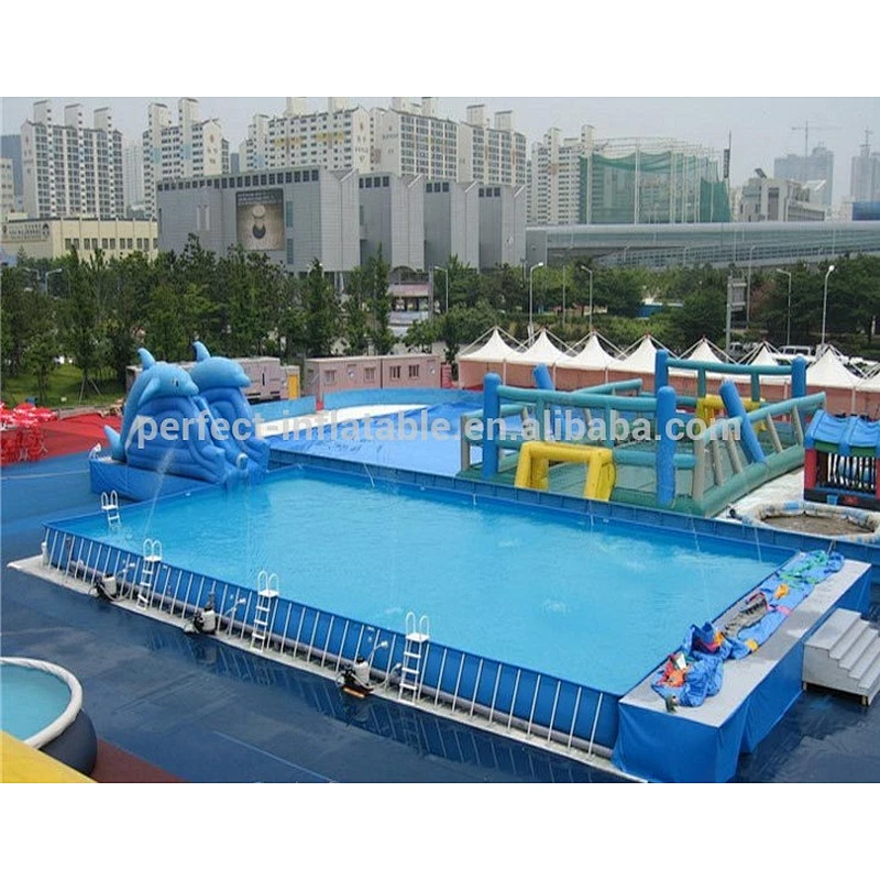 Large inflatable swimming pool with holders and a lovely dolphin slide