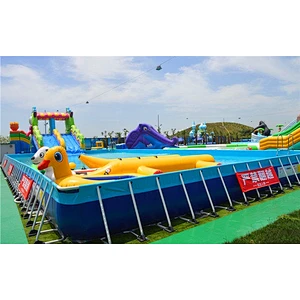 Rigid inflatable adult swimming pool with holders in the garden for sale