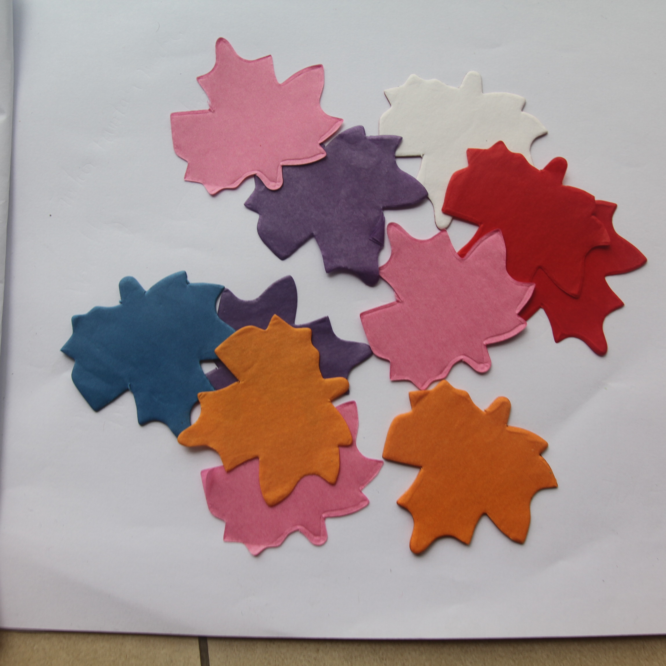 Multi color   Maple leaf shaped  confetti paper for celebrations