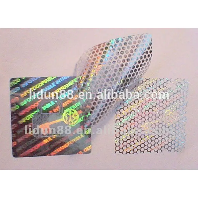 Security hologram barcode label with color changing holographic leave words