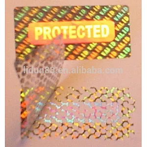 Security hologram barcode label with color changing holographic leave words