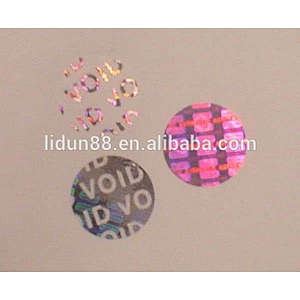 Security hologram barcode label with color changing holographic leave words