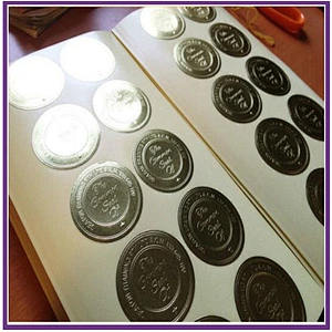 High quality hot stamping printing customized embossed golden hologram sticker label