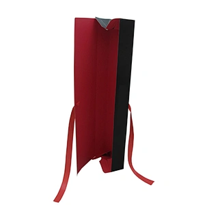 Custom folded black outside red inside wig box with ribbon