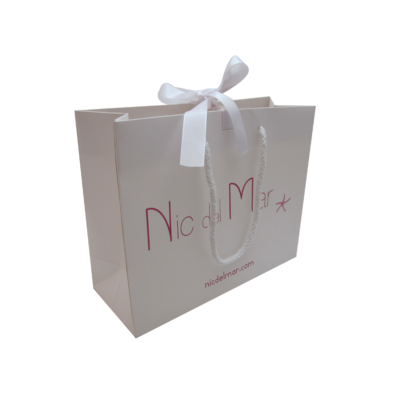 Paper gift bags with ribbon handles