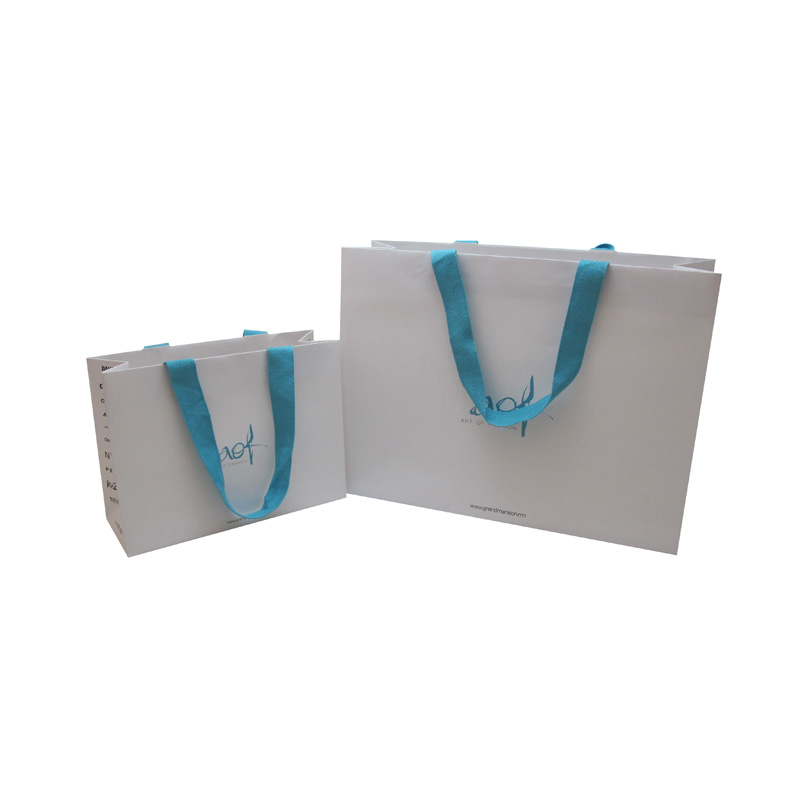 Luxury jewelery paper bags with blue ribbon rope