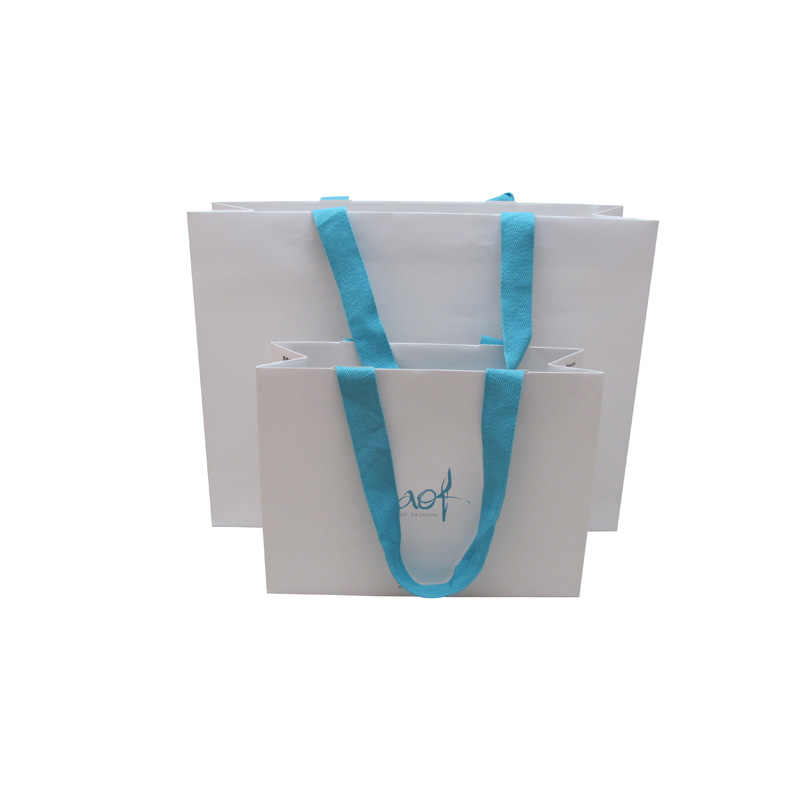 Luxury jewelery paper bags with blue ribbon rope