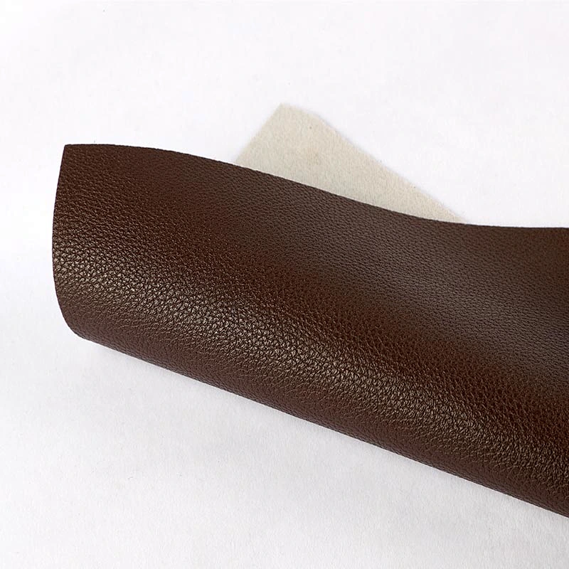 pvc synthetic leather handbags leather with lychee emboss with brush backing