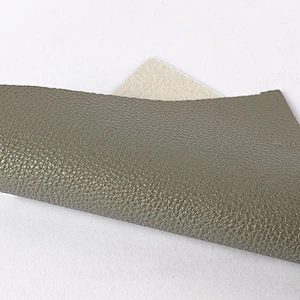 Embossed Litchi grain pvc leather for woman handbags with brush backing