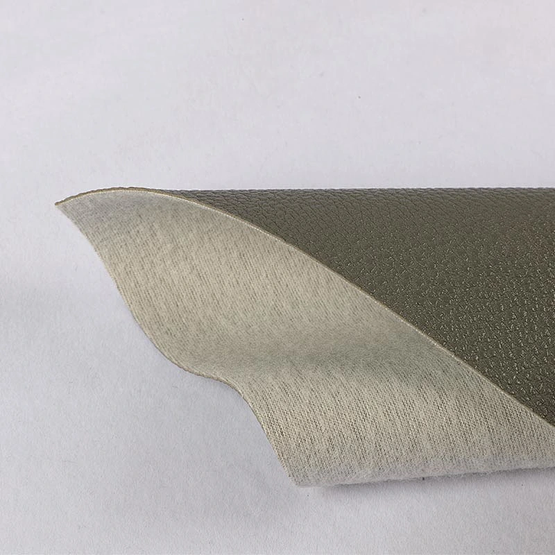 Embossed Litchi grain pvc leather for woman handbags with brush backing