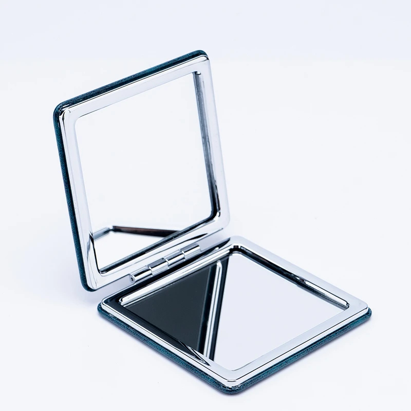 2022 New trendy double sided high definition mini mirror portable sewing pattern travel makeup mirror