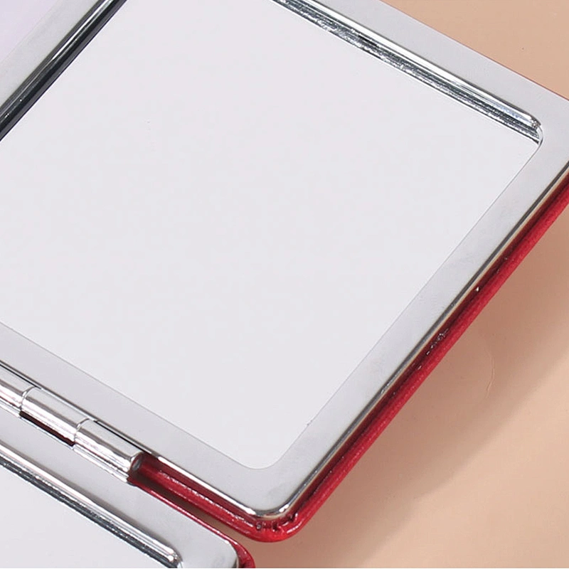 2022 New trendy double sided high definition mini mirror portable sewing pattern travel makeup mirror