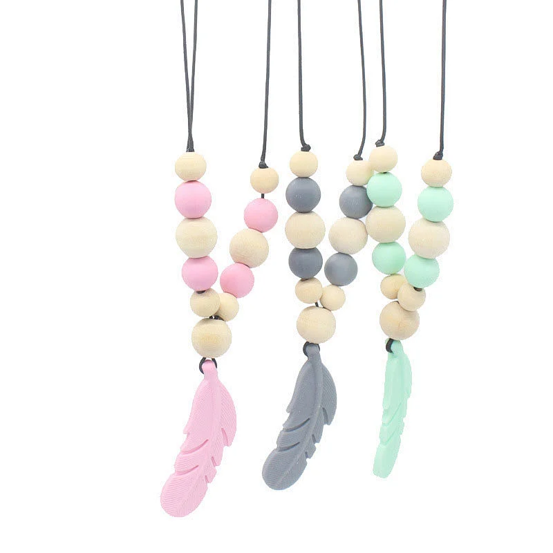 Hot sale food grade  silicone non-toxic  baby teething chewable necklace teether with feather