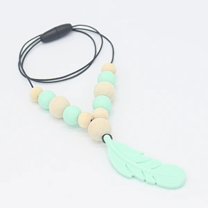 Hot sale food grade  silicone non-toxic  baby teething chewable necklace teether with feather