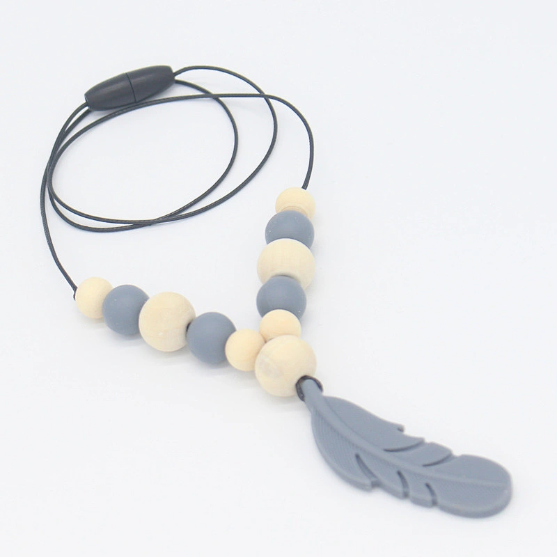 Hot sale food grade  silicone non-toxic  baby teething chewable necklace teether with feather