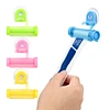 WANGDA Vacuum Sucker Hook Dispenser Squeeze Toothpaste Dispenser Facial Cleanser Squeezer Clip Tube Squeezer
