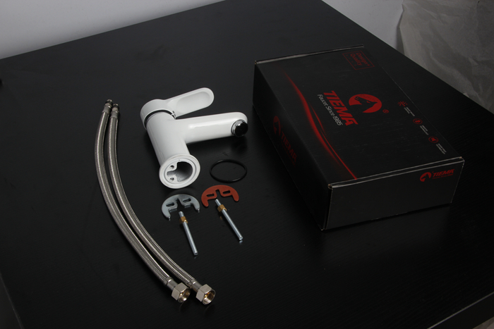 white basin faucet