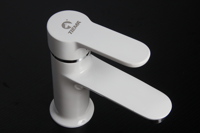 white basin faucet