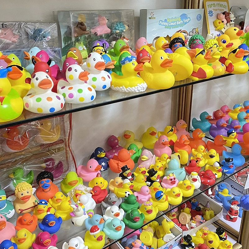 Promotional  Soft Toy Animal Tub Swimming Floating Big Black Printed Rubber Ducky Bathtub Squeeze Sounding Squeaky Bath Duck