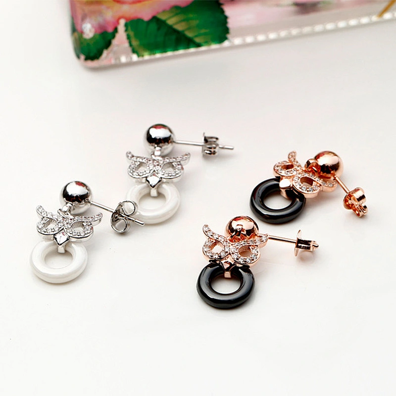 Miss Jewelry CZ micro paved Owl post black ceramic earrings