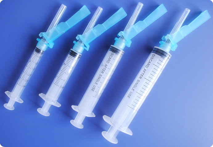 safety syringe with retractable needle