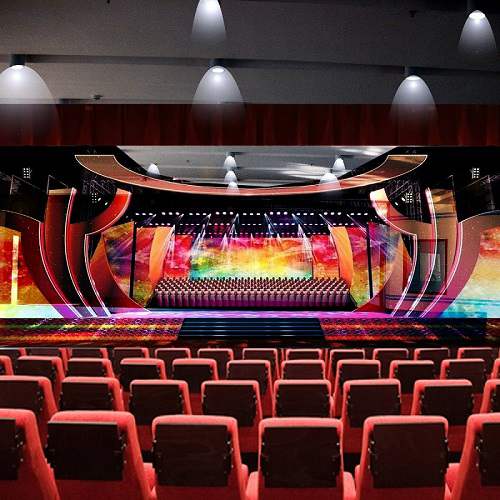 Theater stage with colorful lighting and illuminated curved borders