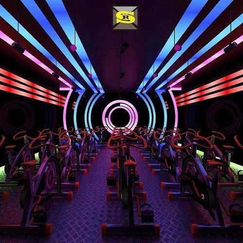 Indoor cycling studio with multicolor linear lighting along the walls and ceiling
