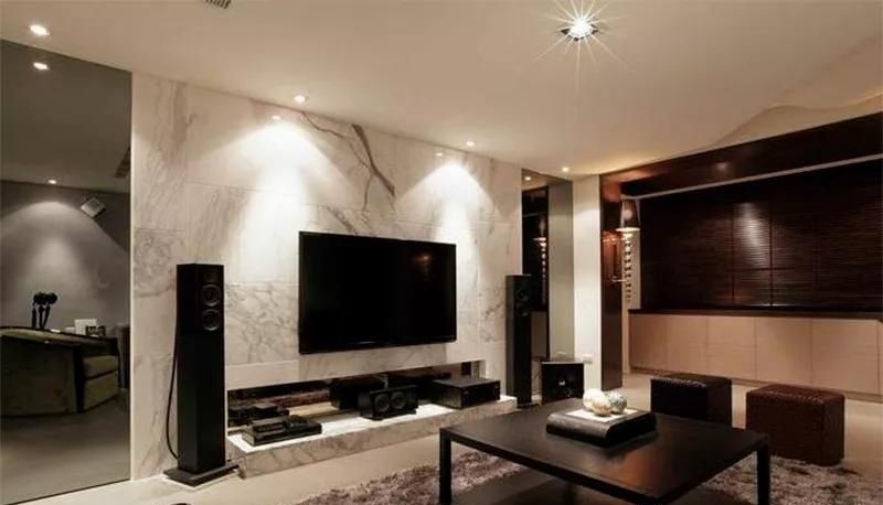 The spotlight is too close to the tv wall background