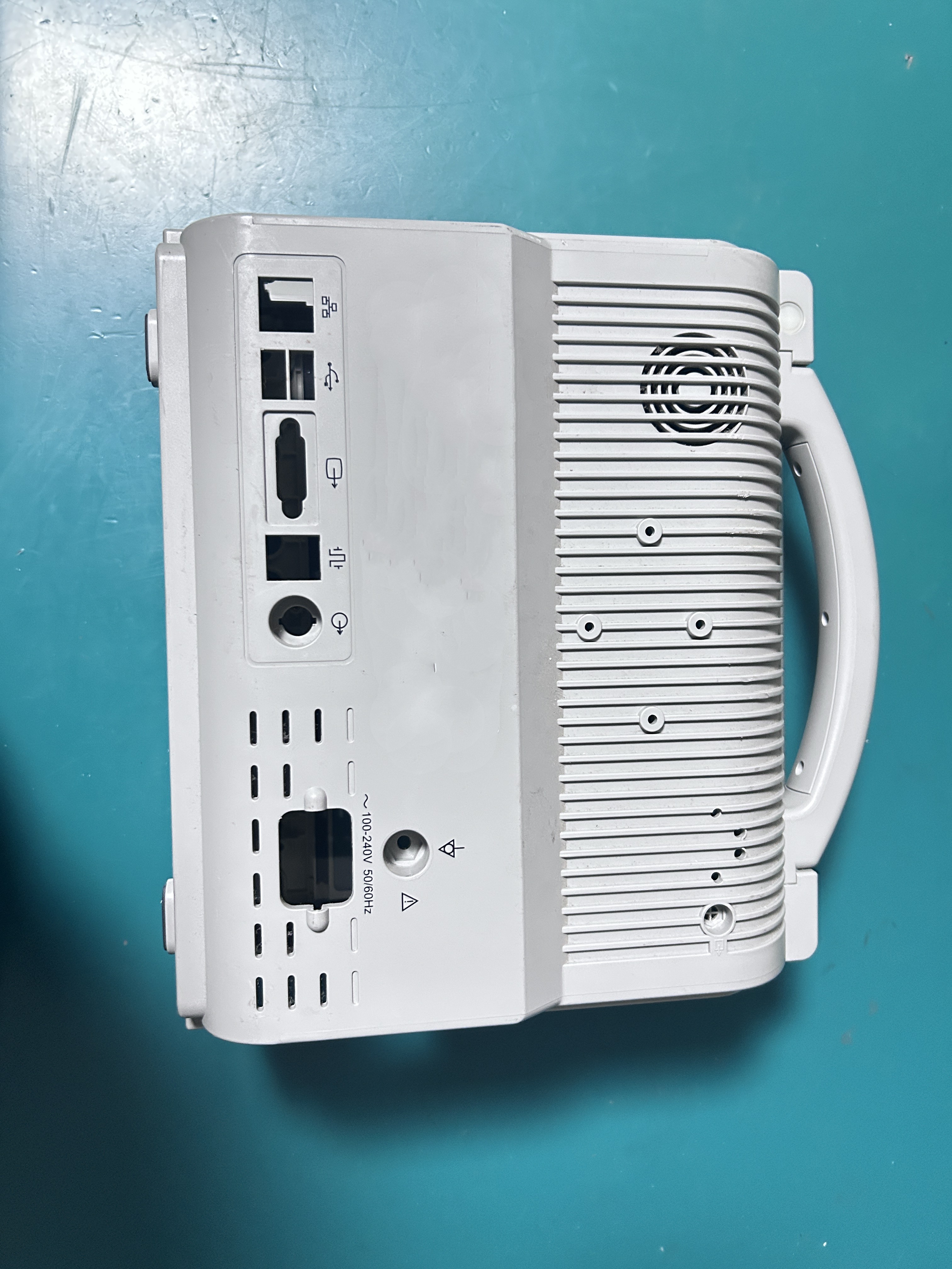 The complete casing for the Biocare IM12 monitor includes a handle and protective screen