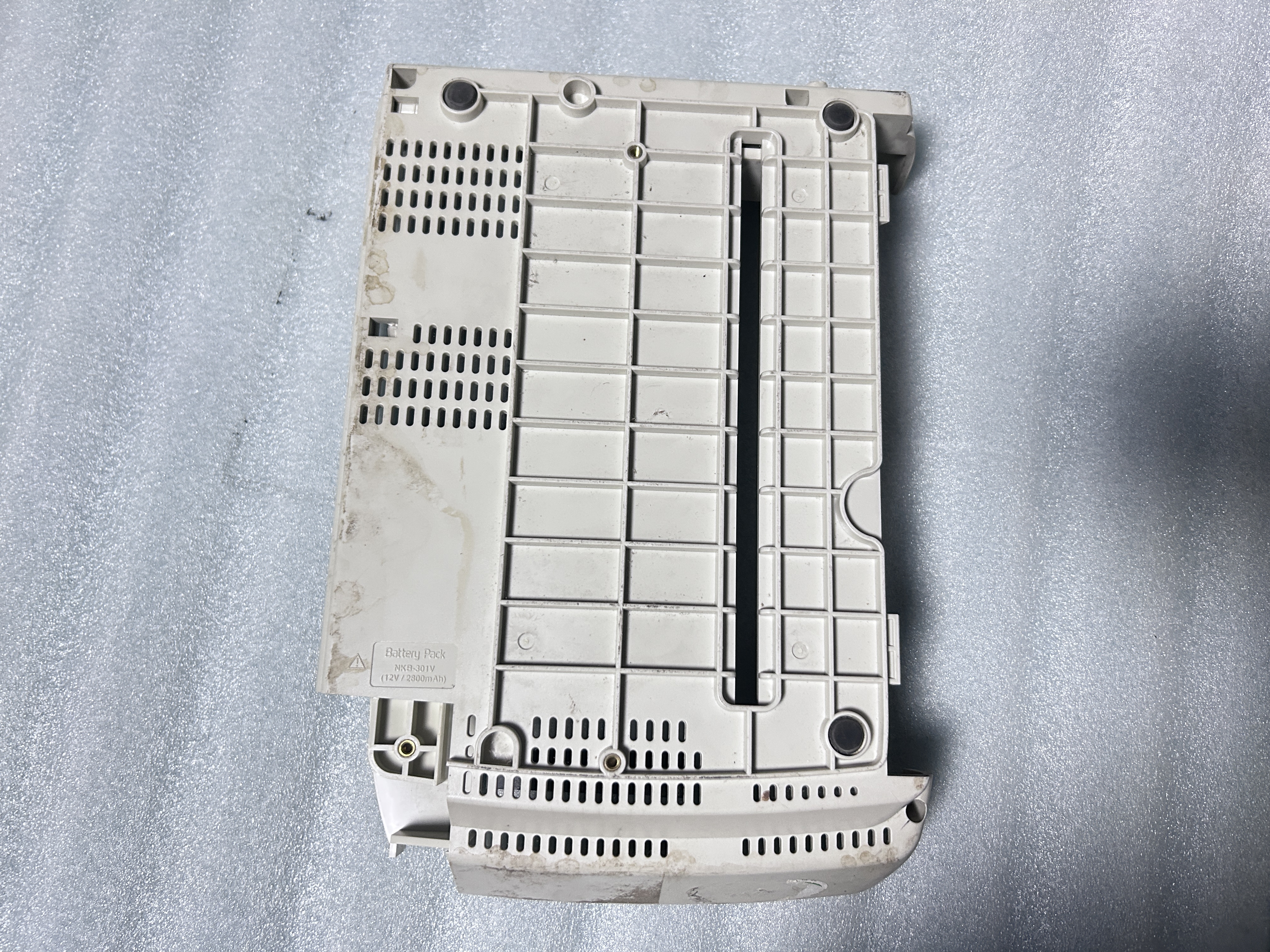 Back cover of the Nihon Kohden ECG-1350P electrocardiograph