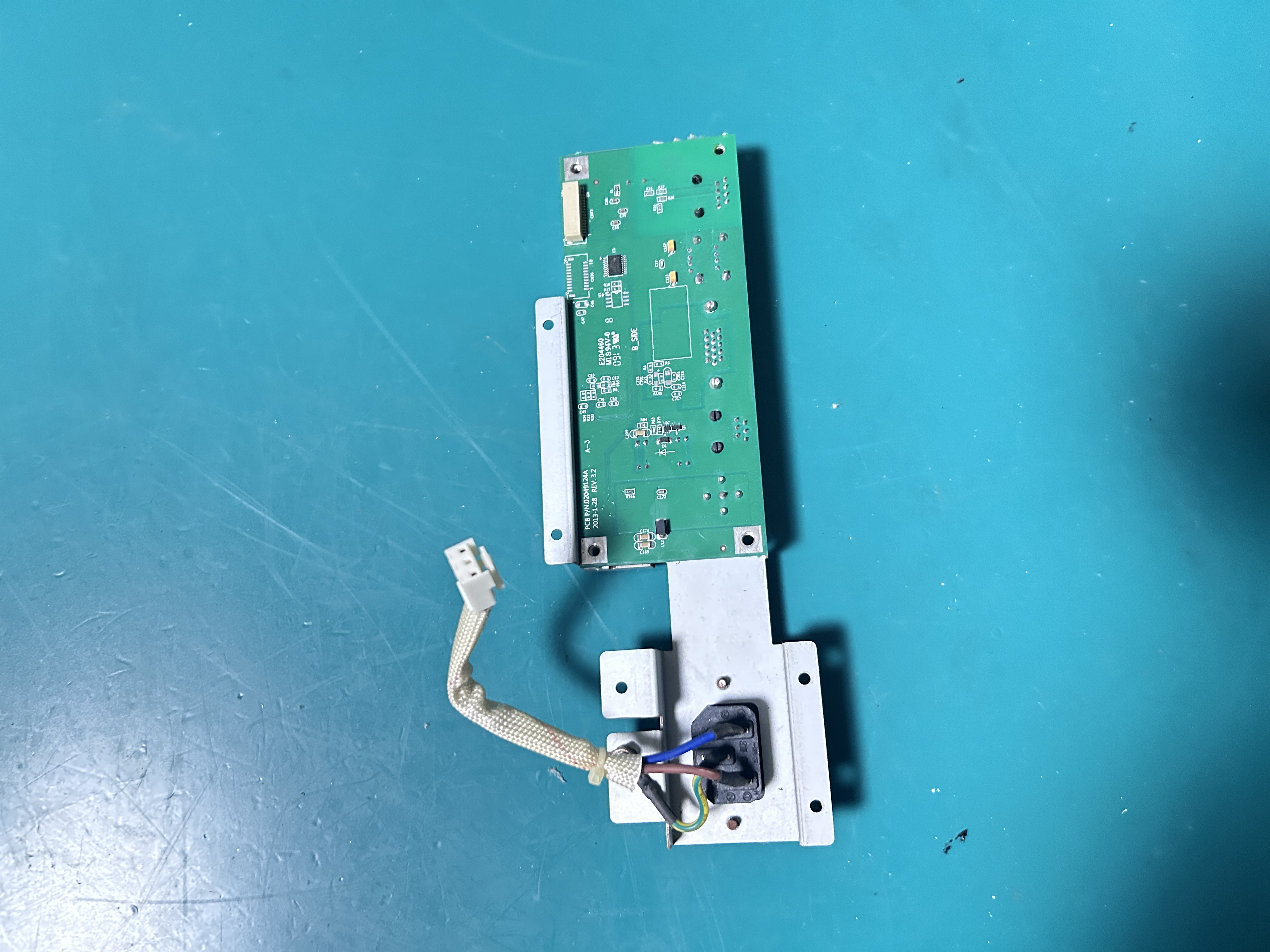 The Biocare IM12 monitor VGA board includes a three-prong power connector, a network card, and a USB interface 02049124A